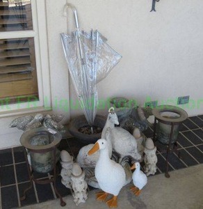 lot 780 image: Outdoor dcor including cast concrete architectural elements, concrete animals, planters and more as shown