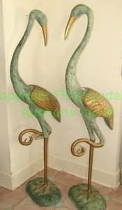 lot 219 image: Metal patinated green and gold HeronsCranes on large sturdy bases over 5ft tall