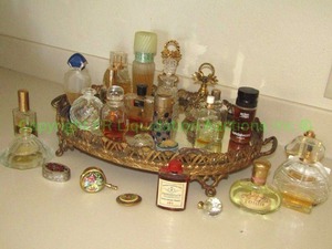 lot 213 image: Perfume bottle selection and mirrored tray including enameled photo frame plus as shown