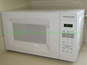 lot 243 image: Frigidaire microwave Model FCCM0724LW