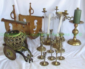 lot 324 image: Brass dcor items including assorted candlesticks, figural rickshaw, firewood stand, plus
