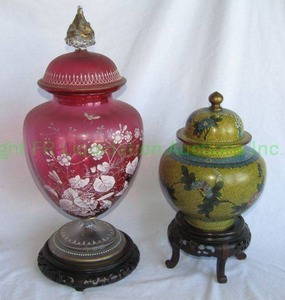 lot 329 image: Hand Painted Bohemian Czech ruby glass lidded vessel (20 tall) with Cloisonn style ginger jar with lid on stand (14 tall) as shown