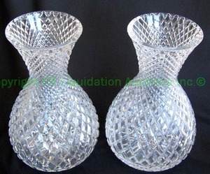 lot 359 image: 24% Lead crystal vase duo. All over diamond cross hatch pattern Matched pair. 12 tall each