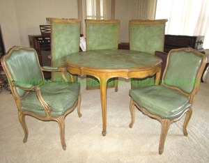 lot 283 image: Salon table with green leather top (48 x 30) and 4 matching green leather chairs w nail head trim. Matches lot 340