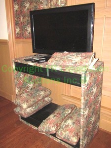 lot 388 image: Sony Bravia TV 31 screen and custom TV cabinet with matching throw pillows