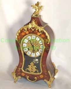 lot 363 image: Italian made French boulle mantel clock with inlaid veneer, brass embellishments and German made works, 17 tall