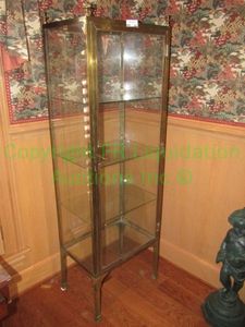 lot 362 image: Brass and glass standing display cabinet with brass finials. 20 x 14 x 62