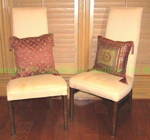 lot 372 image: High back mid century upholstered parsons chairs w pillows (one marked Borgata), Pair