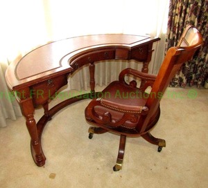 lot 474 image: Pulaski Furniture Co. semi circular leather nail head top writing desk (56 x 28 x 30) and matching leather chair (wheels need tightened) USA