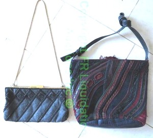 lot 807 image: Sharif (USA) vintage clutch w shoulder chain and Walborg Hong Kong vintage leather and snake skin textured bag