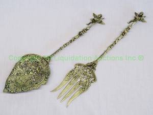 lot 818 image: Antique signed Bordini Italian brass ornate servers with figural cherub handles, marked Bordini Italy