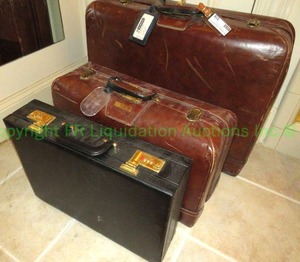 lot 518 image: Vintage leather wrapped luggage (Inside of one is in rough condition) and briefcase