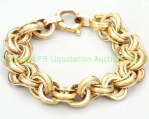 lot 686 image: 14K Yellow Gold Italian Textured Link Cable Chain Bracelet with oversized O-Ring Clasp. 8.5L Each link is made up of a texture wide round link flanked on each side by solid round links. Marked 14KT M Pictorial Marks Italy.