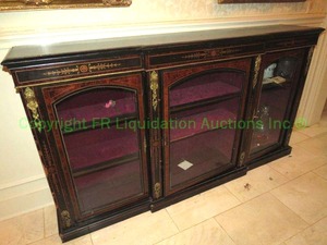 lot 402 image: Empire ebonized breakfront glass front display cabinet with satinwood inlay and ormolu mounts 72 x 15 x 39