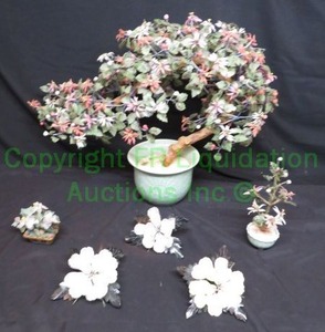 lot 730 image: Gemstone potted trees and flowers as show. Includes green celadon and marble or onyx bases, 19 tall