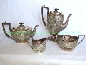 lot 70 image: Antique Walker & Hall Sheffield Victorian era silver plate matching serve ware set