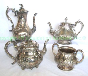 lot 849 image: Antique Victorian era EPNS silver plate serve ware, bird and artichoke finials