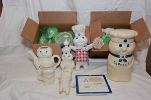 lot 103 image: The Pilsbury Doughboy Cookie Jar, The Pilsbury Doughboy Cookie Plate, The Pilsbury Doughboy bowls, The Pilsbury Doughboy Condiment Dispenser, The Pilsbury Doughboy Assorted Items