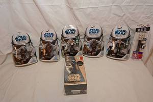 lot 113 image: Unopened Star Wars Trilogy on VHS, Assorted Unopened Star Wars Toys, Chewbacca, Luke Sywalker, Han Solo, Leextar & Nippet