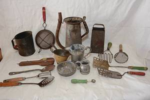 lot 41 image: Antique Kitchen Cook Ware, Cheese Grater, Latle, Potato Smasher, Flour Sifter, Metal Jug, Measuring Cup,