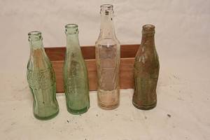 lot 49 image: Vintage Coca Cola Bottles, Vintage Dr. Pepper Bottle, Alexander Banjo Baby Bottle 1900-1920, Vintage Glass Flask, Other Vintage Glass