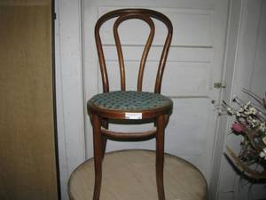 lot 12 image: Old wooden saloon chair