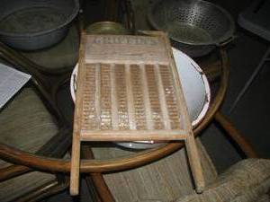 lot 16 image: Rustic Homestead Items (Wash pans, wash board, strainer)