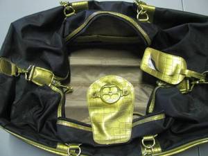 lot 25 image: IMAN Designer duffle bag - like new