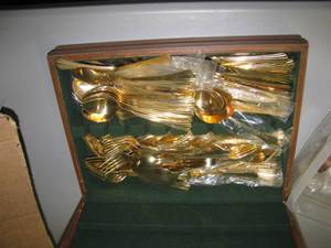 lot 91 image: Farberware utensils in gold tone metal in protective case