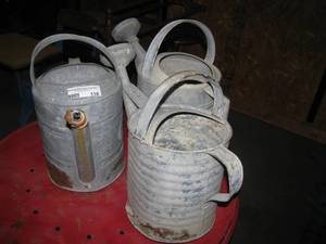 lot 116 image: old galvanized metal water cans - rusted