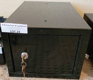 lot 24 image: SAFE BOX WITH KEY IN STYLE, COLOR, AND CONDITION SHOWN.