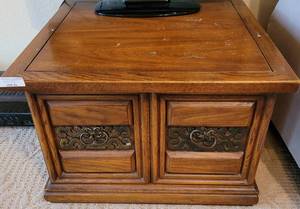 lot 25 image: VINTAGE WOOD END TABLE IN STYLE, COLOR, AND CONDITION SHOWN.