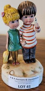 lot 41 image: VINTAGE 1974 MOPPETS MUSIC BOX IN STYLE, COLOR, AND CONDITION SHOWN.