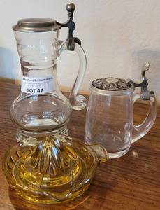 lot 47 image: VINTAGE GLASS CARAFFES AND JUICER AS SHOWN.