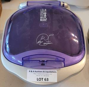 lot 63 image: GEORGE FOREMAN GRILLING MACHINE AS SHOWN.