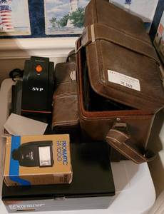 lot 169 image: CANON AND SOLIGOR CAMERA LENSES, FLASHES, AND MORE AS SHOWN.