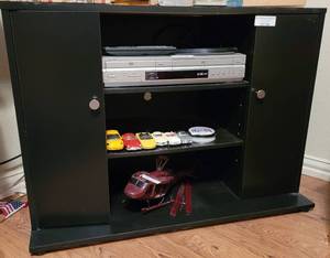 lot 180 image: MEDIA CENTER  CABINET IN STYLE, COLOR, AND CONDITION SHOWN. CONTENTS NOT INCLUDED