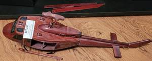lot 183 image: WOODEN HELICOPTER MODEL AS SHOWN. NEEDS REPAIRS.