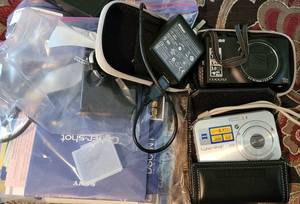 lot 209 image: NIKON COOLPIX AND SONY CYBER SHOT DIGITAL CAMERAS WITH ACCESSORIES AS SHOWN.
