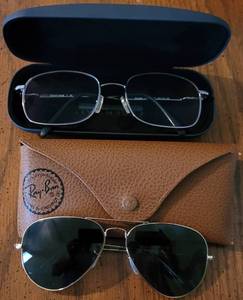 lot 210 image: RAY BAN SUN GLASSES WITH CASE PLUS READING GLASSES AS SHOWN.