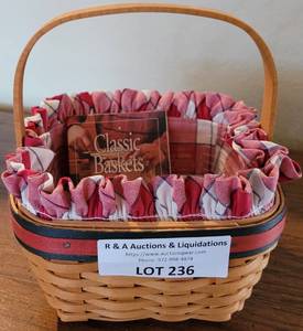 lot 236 image: LONGABERGER COLLECTORS CLUB 2001 EDITION SAFFRON BOOKING BASKET IN STYLE, COLOR, AND CONDITION SHOWN.