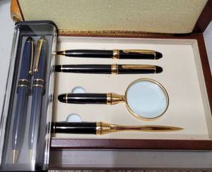 lot 387 image: PEN SETS IN STORAGE CASES AS SHOWN.