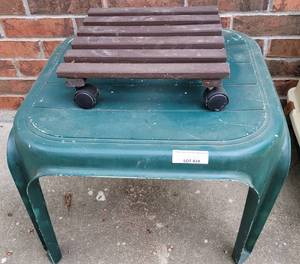 lot 419 image: PLASTIC TABLE AND PLANT ROLLING STAND AS SHOWN.