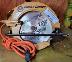 lot 428 image: BLACK & DECKER 7 14 CIRCULAR SAW MODEL 7308 WITH EXTRA BLADE AS SHOWN.