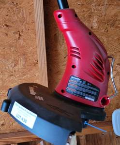 lot 438 image: HOMELITE ELECTRIC 13 STRING TRIMMER MODEL UT41110 AS SHOWN.