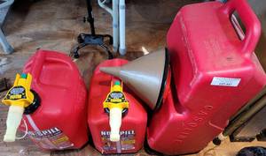 lot 447 image: LOT OF GAS CONTAINERS AND FUNNELS AS SHOWN.