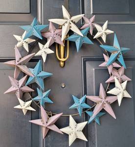 lot 85 image: METAL STARS WALL DECOR IN STYLE, COLOR, AND CONDITION SHOWN.