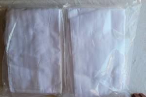 lot 168 image: KING SIZE WHITE HIGH THREAD COUNT 60% ORGANIC REGENERATED COTTON 40% POLY SATEEN DOBBY STRIPE PILLOWCASES. 40L x 20W 12 PER PACK (YOUR BID X 2)