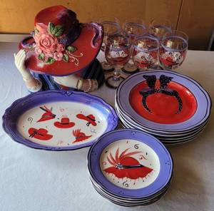 lot 183 image: LARGE LOT OF RED HAT THEMED ITEMS INCLUDING COOKIE JAR, SERVING PLATTER, PLATES, WINE GOBLETS AS SHOWN.