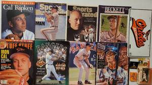lot 104 image: LOT OF CAL RIPKEN JR. COMMEMORATIVE ITEMS INCLUDING MAGAZINES, FIGURES, AND MORE AS SHOWN.
